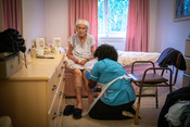 Elderly woman receiving care during the 2020 coronavirus pandemic